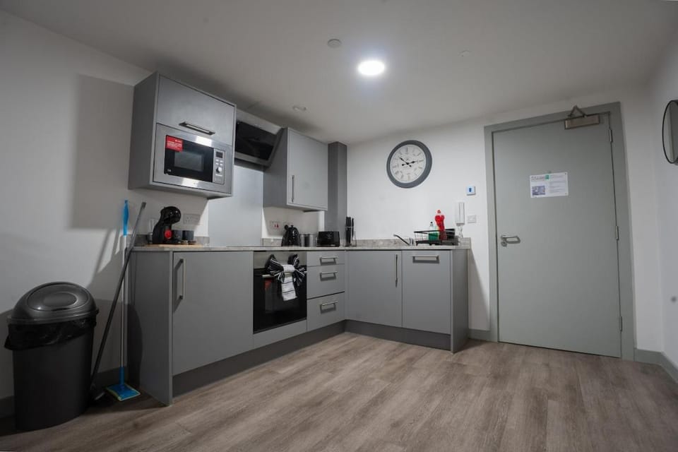 Kitchen or kitchenette, oven, stove
