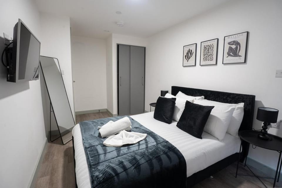 Bed, TV and multimedia, Evening entertainment, Bedroom, towels, wardrobe