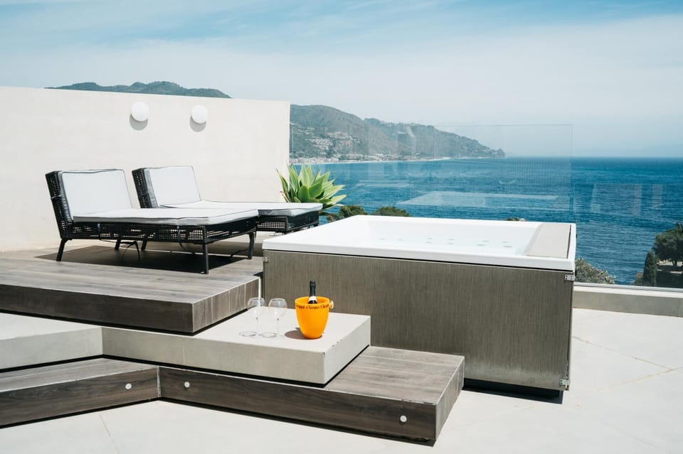 Patio, Hot Tub, View (from property/room), Seating area, Sea view, sunbed