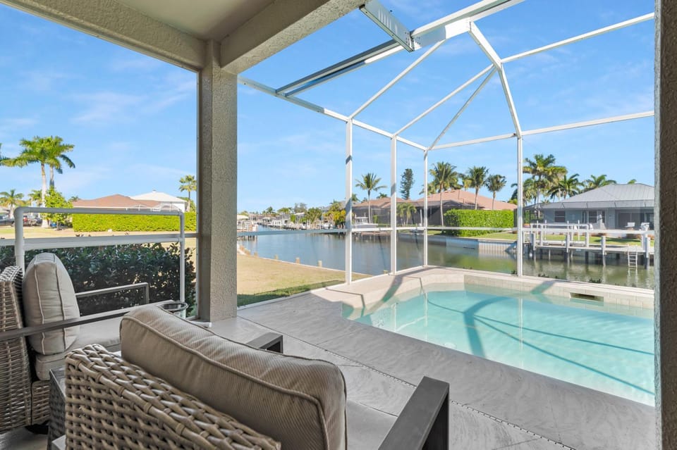 Patio, Day, View (from property/room), Balcony/Terrace, Seating area, Pool view, Swimming pool