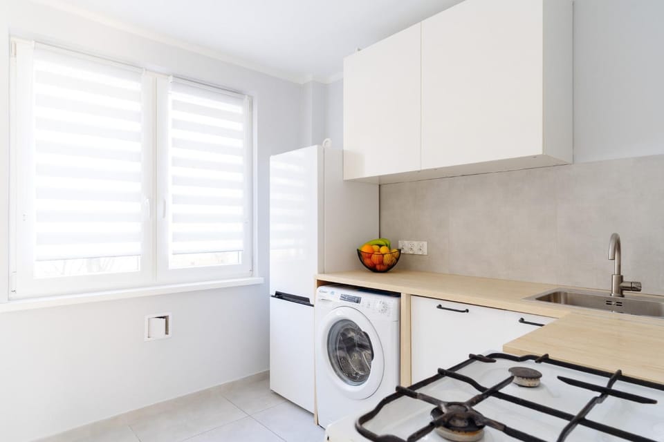 Kitchen or kitchenette, dishwasher, oven, stove, washing machine, kitchen