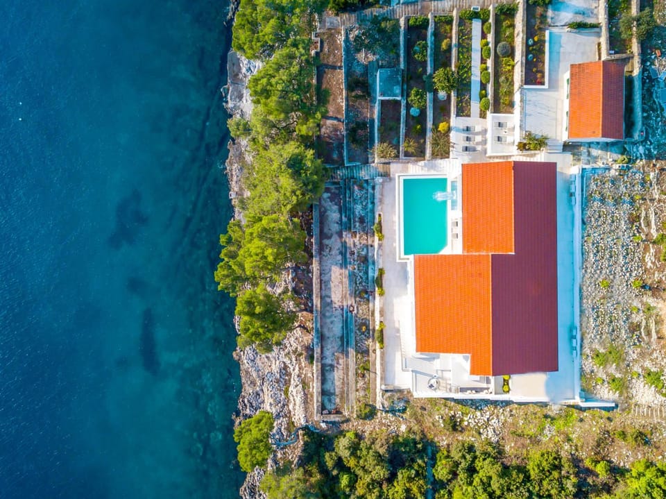 Property building, Bird's eye view, Beach, Swimming pool