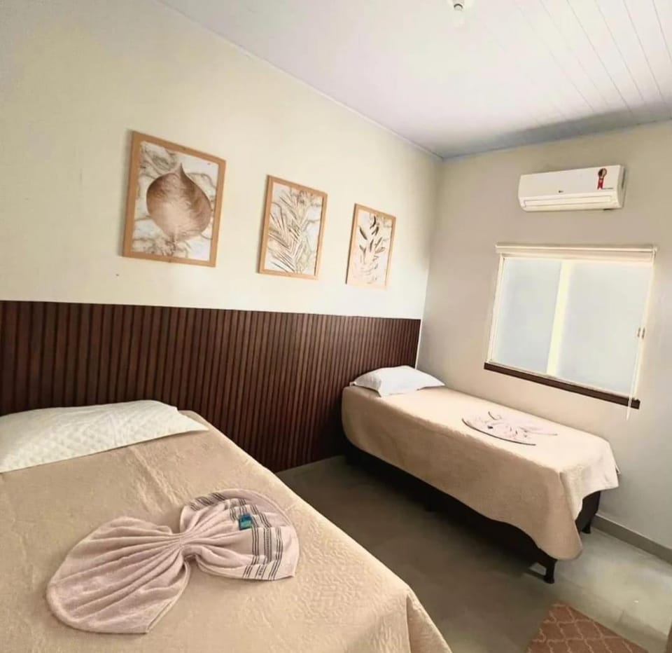 Bed, Photo of the whole room, Bedroom, towels, air conditioner