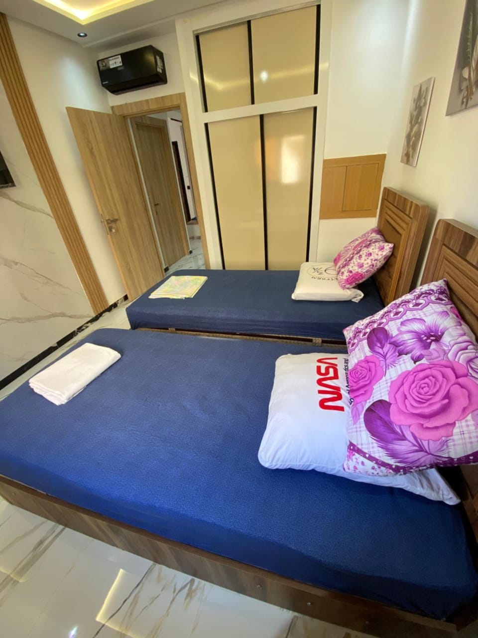 Bed, air conditioner