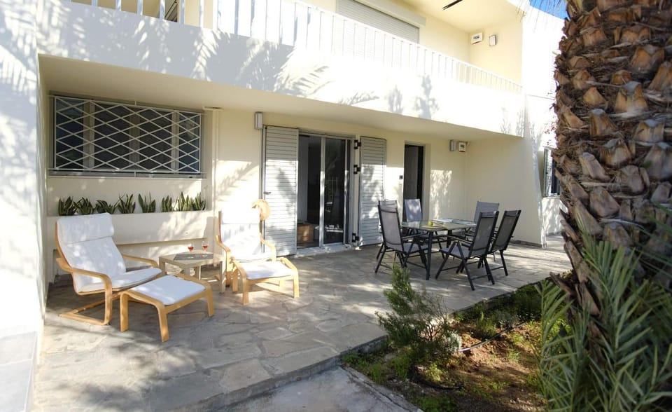Property building, Garden, Seating area, Dining area