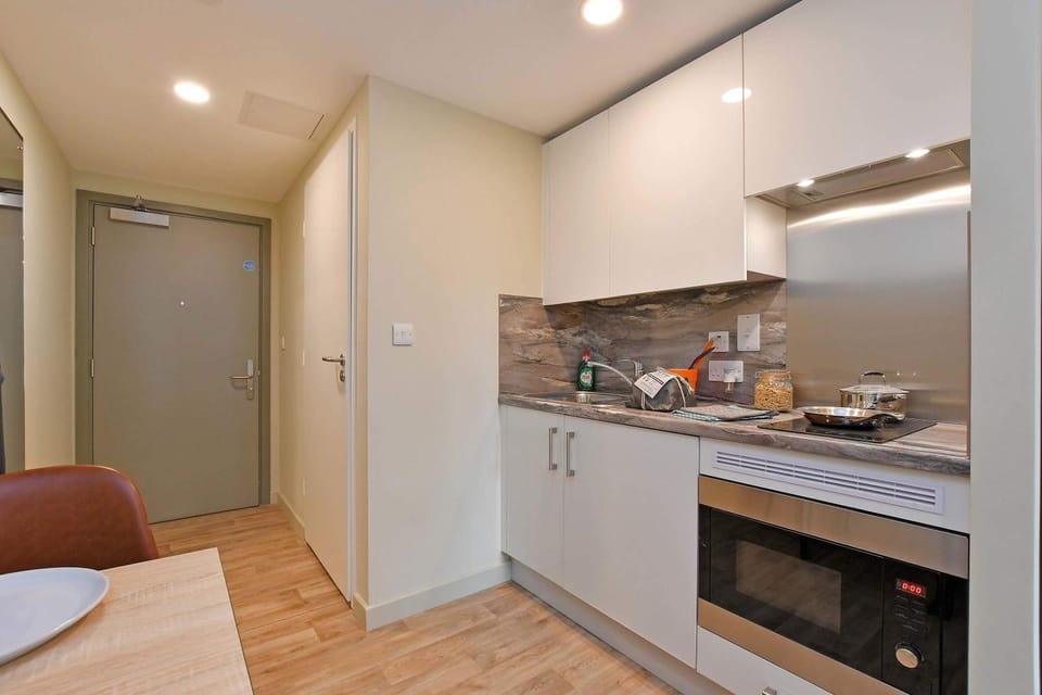 Kitchen or kitchenette, stove