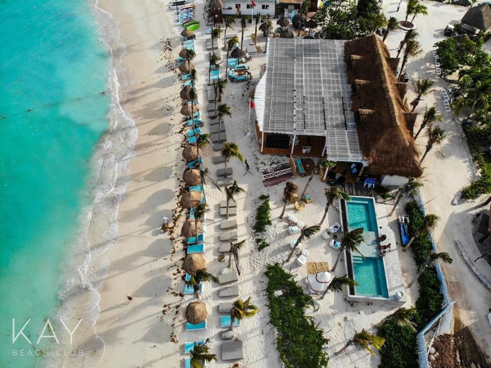 Nearby landmark, Natural landscape, Bird's eye view, Beach, City view, Swimming pool, Location, sunbed