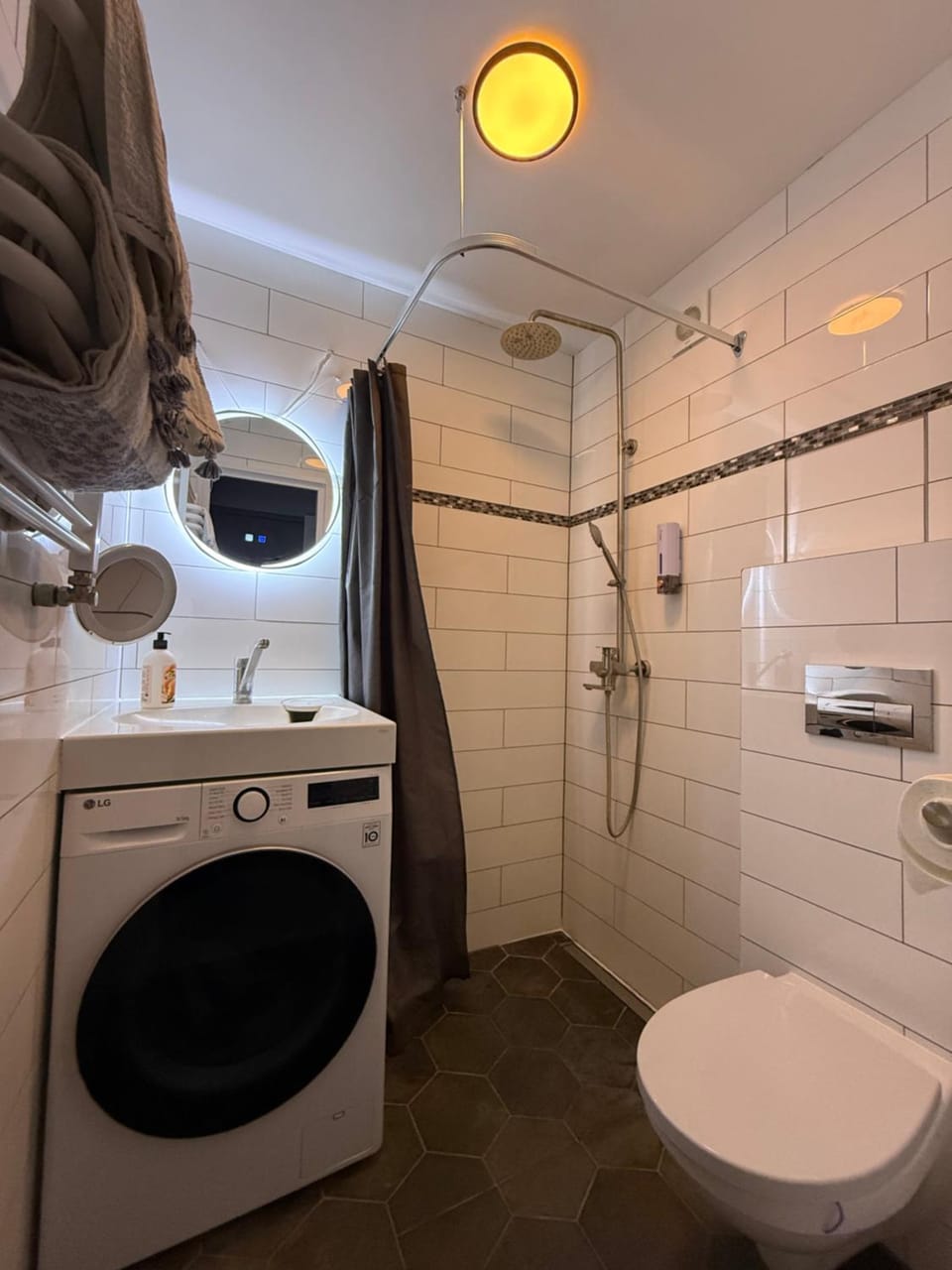 Shower, Toilet, Bathroom, towels, washing machine, dryer