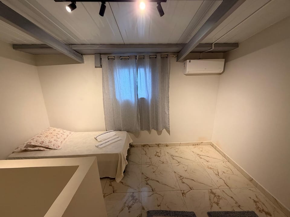 Duplex aconchegante 04 - Ar condicionado perto do Camaru, próximo ao UMC e Uberlândia Shopping Apartment in Uberlândia