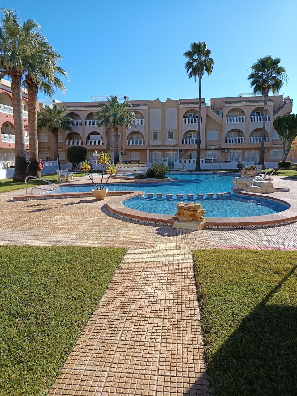 Property building, Living room, Swimming pool