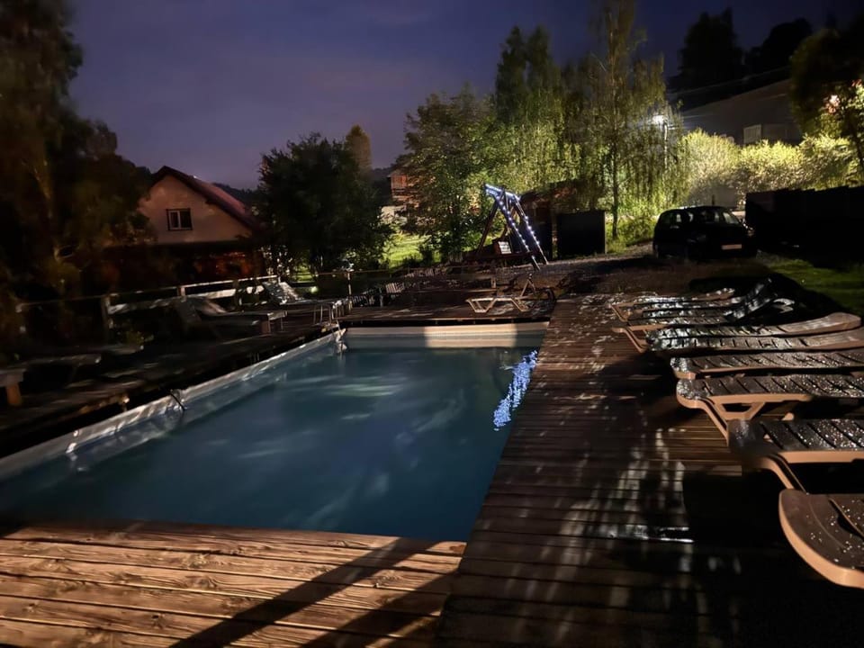 Patio, Night, Natural landscape, Pool view, Swimming pool, sunbed