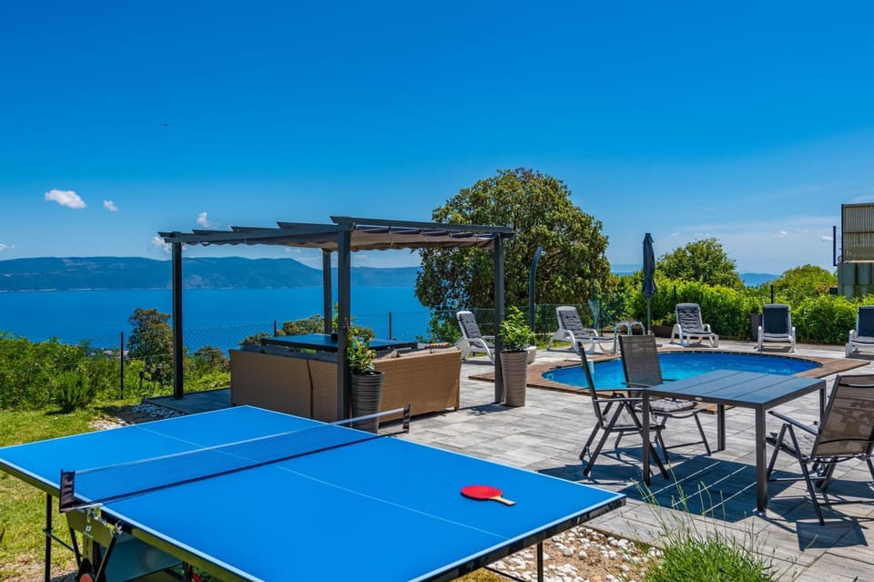 Patio, Day, Natural landscape, Table tennis, Dining area, Sea view