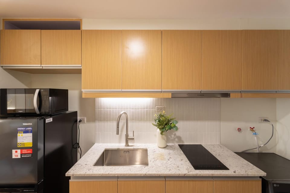 Luxury 1 BR City View in Park Mckinley West Fast Wi-Fi Washer Dryer Apartment hotel in Makati