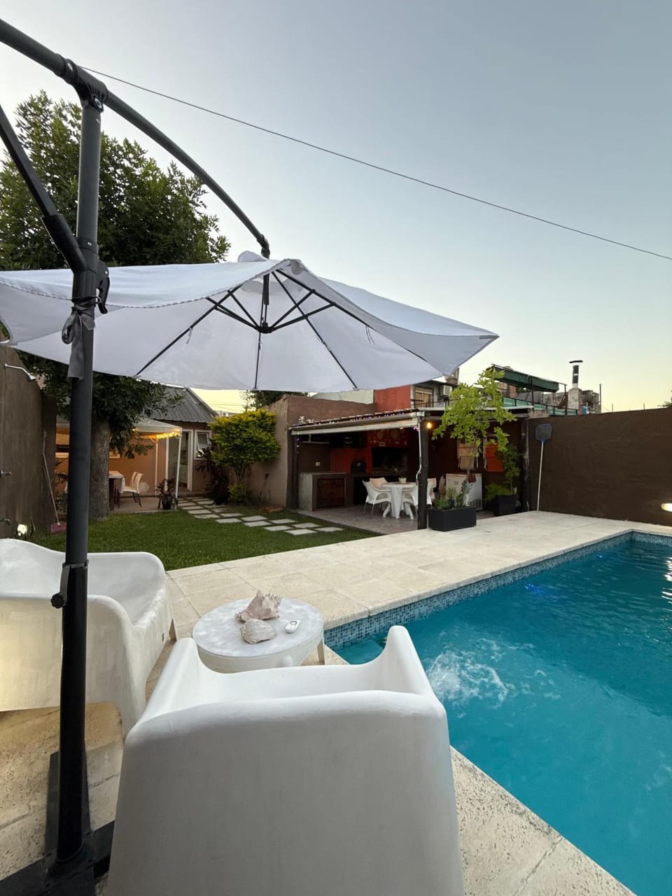 Patio, Day, Living room, Seating area, Dining area, Pool view, Swimming pool, sunbed