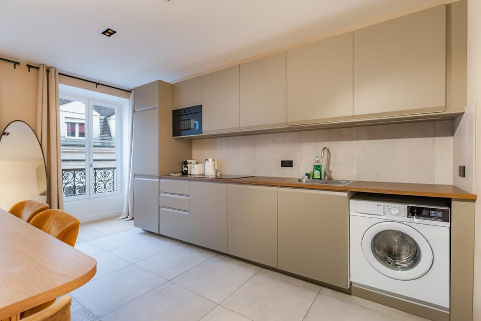 Kitchen or kitchenette, oven, stove, washing machine