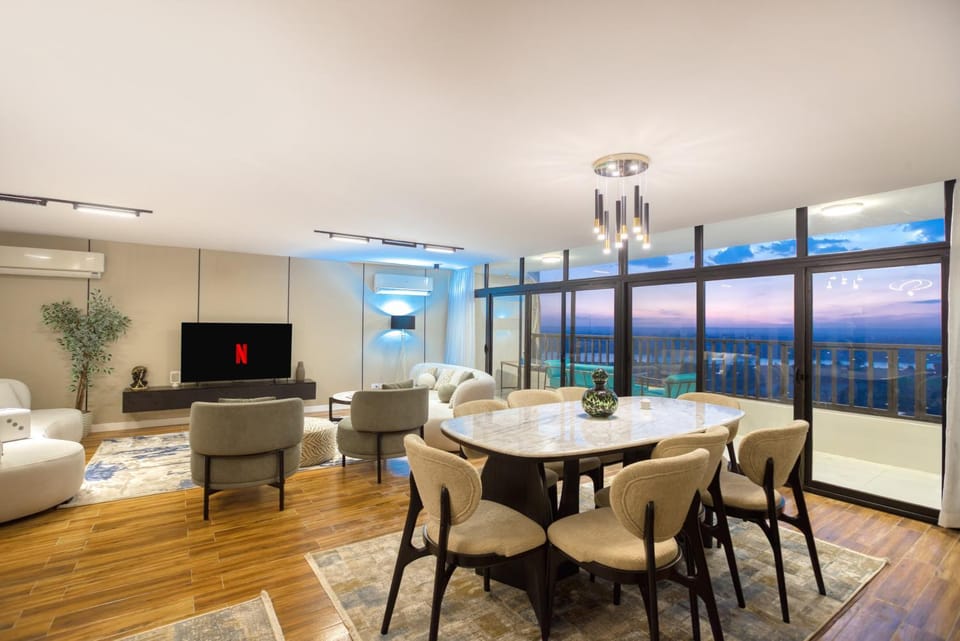 Living room, Dining area, River view