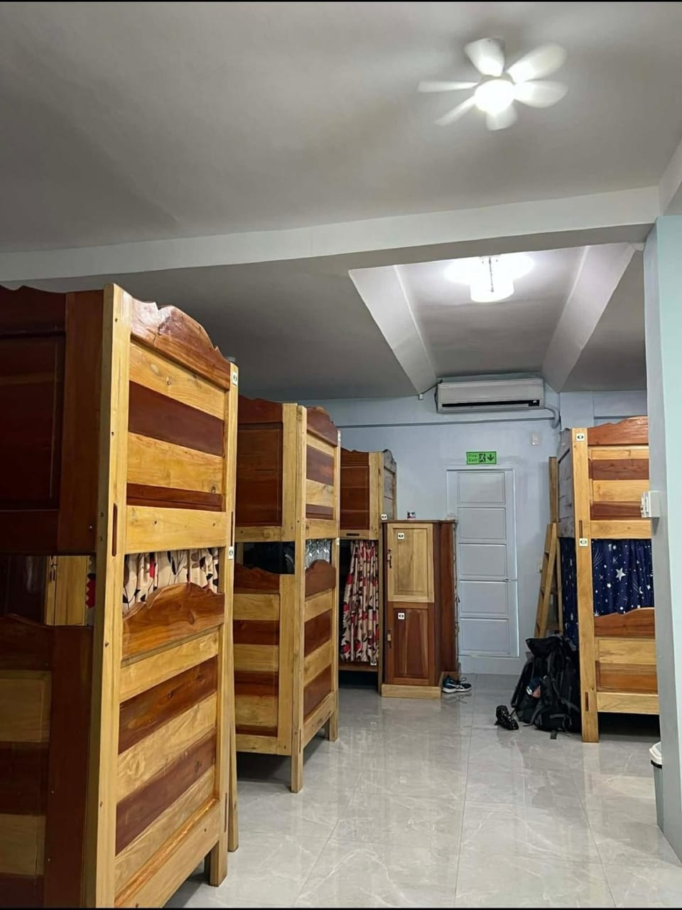 Photo of the whole room, bunk bed, air conditioner