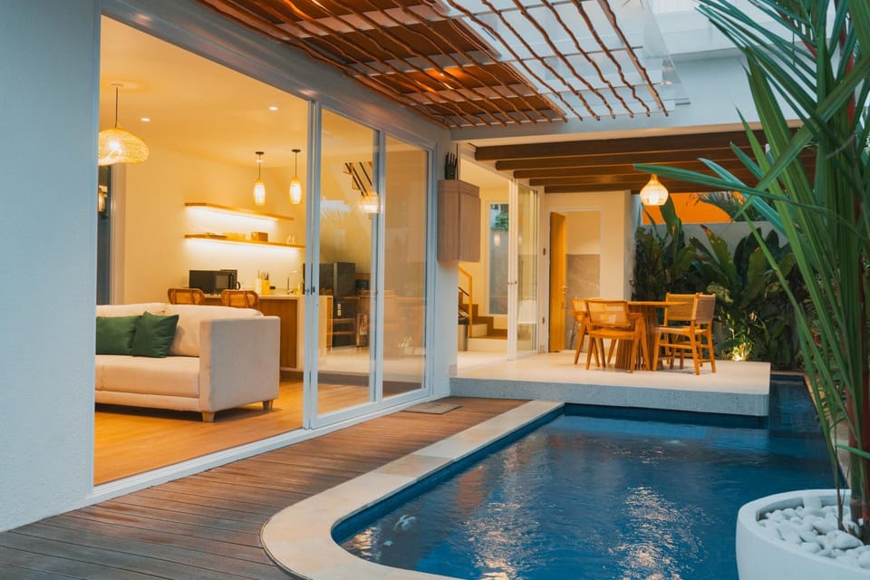 Patio, Living room, Seating area, Pool view, Swimming pool