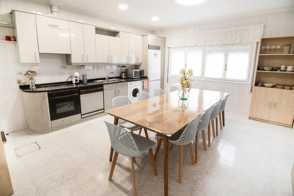 Kitchen or kitchenette, dishwasher, oven, stove, toaster