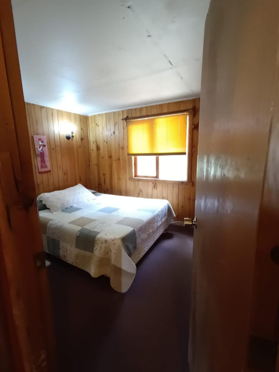 Cabin by the day in front of the Pastahue Lagoon Cabin in Los Lagos, Chile