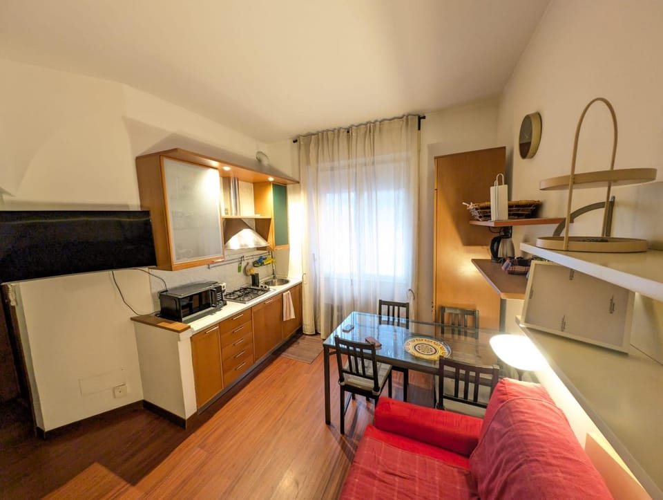 Bed, Kitchen or kitchenette, Seating area