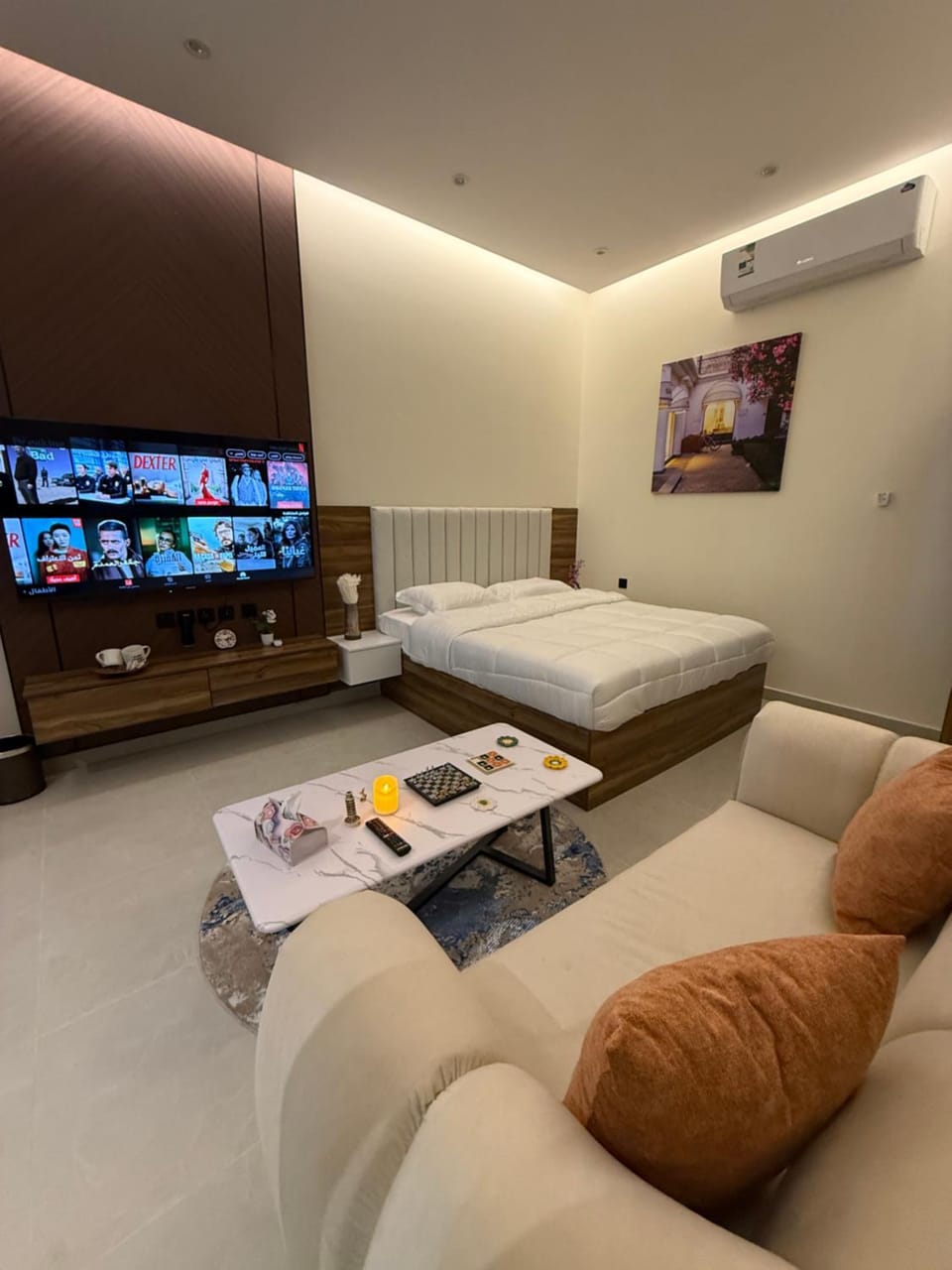 Communal lounge/ TV room, Bed, Living room, Seating area, Bedroom, air conditioner