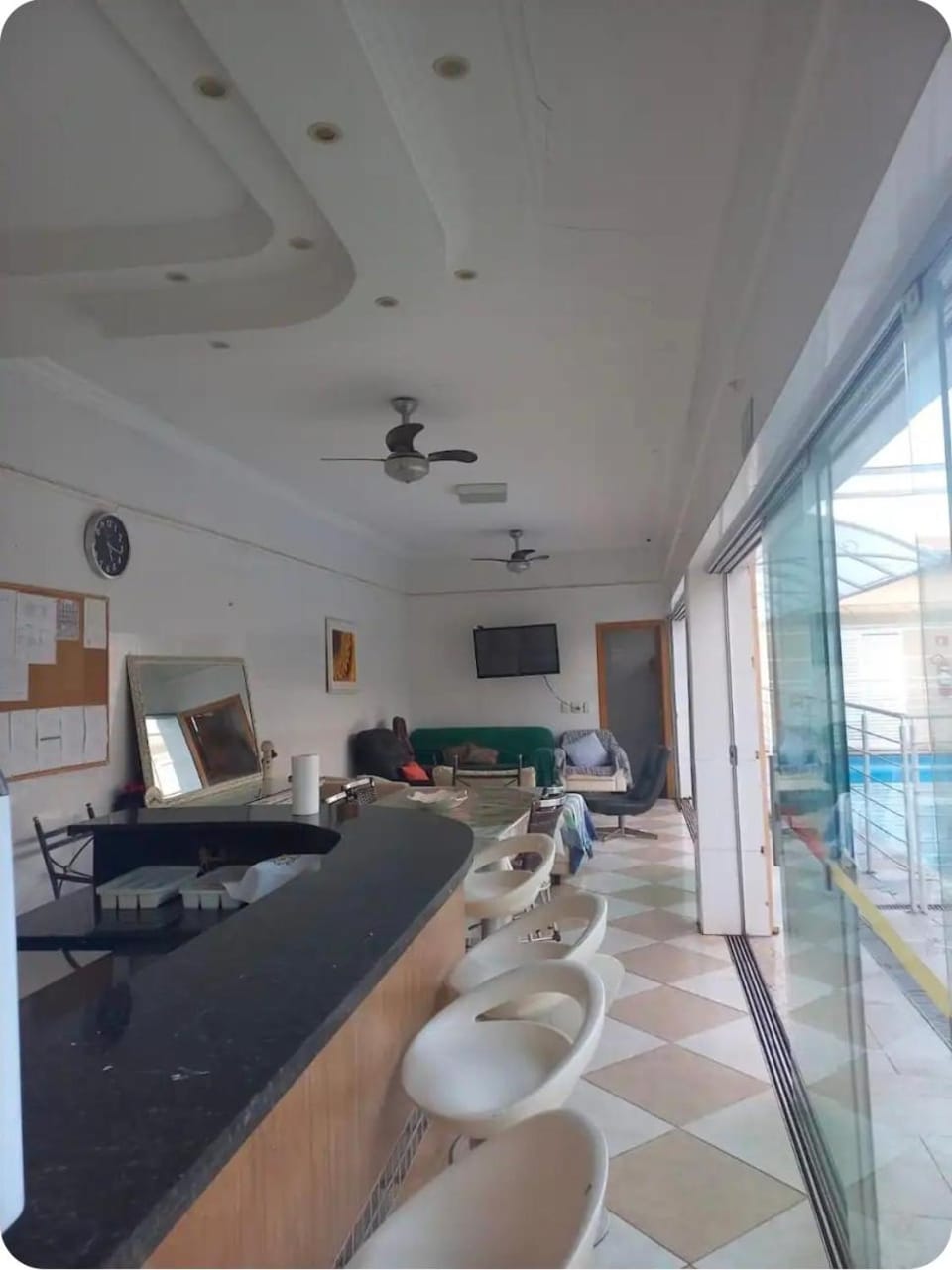 TV and multimedia, Living room, Seating area, Pool view, Swimming pool