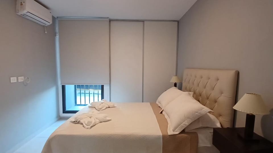 Bed, Photo of the whole room, Bedroom, towels, air conditioner
