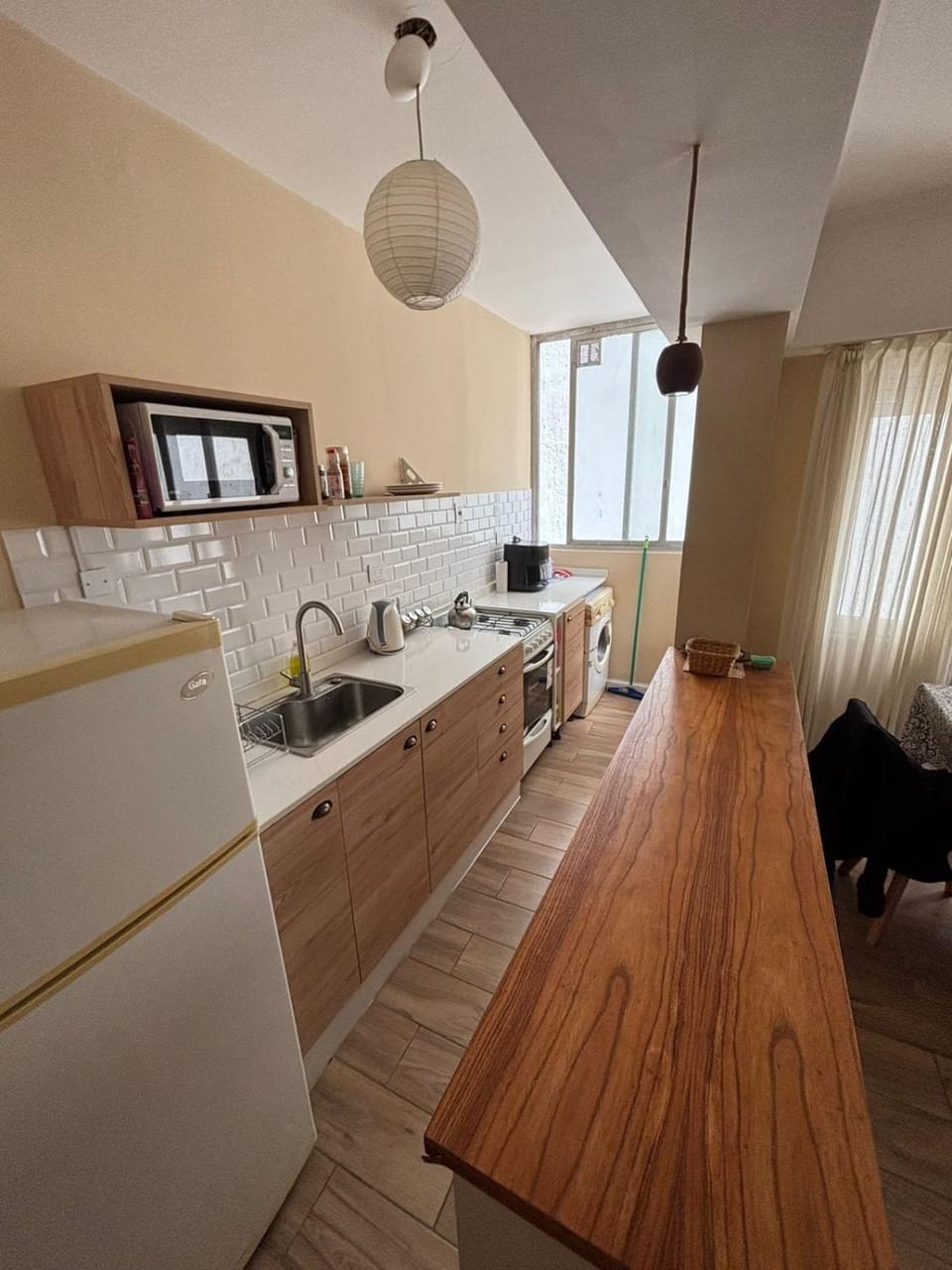 Kitchen or kitchenette, oven, toaster