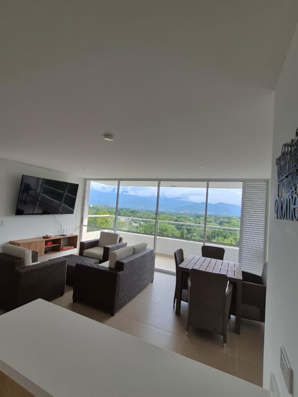 Natural landscape, TV and multimedia, Living room, Seating area, Dining area