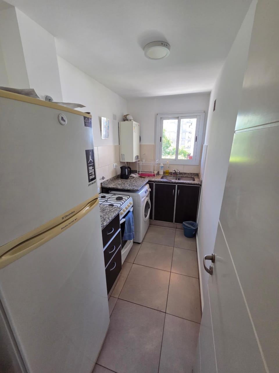 Kitchen or kitchenette, oven