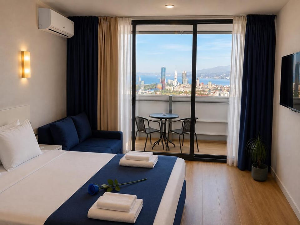 Communal lounge/ TV room, Bed, Natural landscape, TV and multimedia, View (from property/room), Balcony/Terrace, Living room, Photo of the whole room, Seating area, Evening entertainment, Bedroom, hair dresser, towels, air conditioner