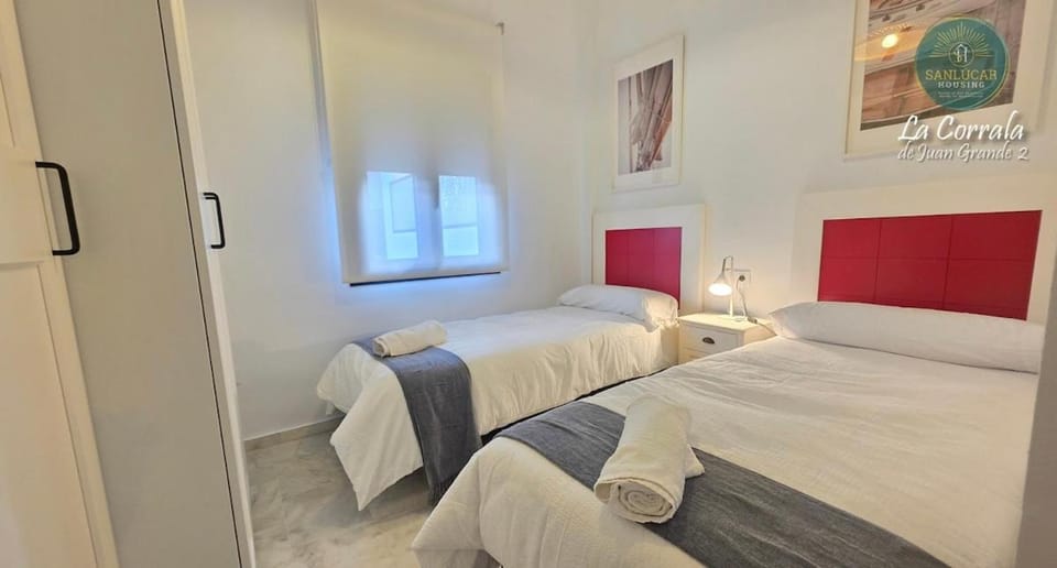 Corrala Juan Grande 2 con garaje by Sanlúcar Housing Apartment in Sanlúcar de Barrameda