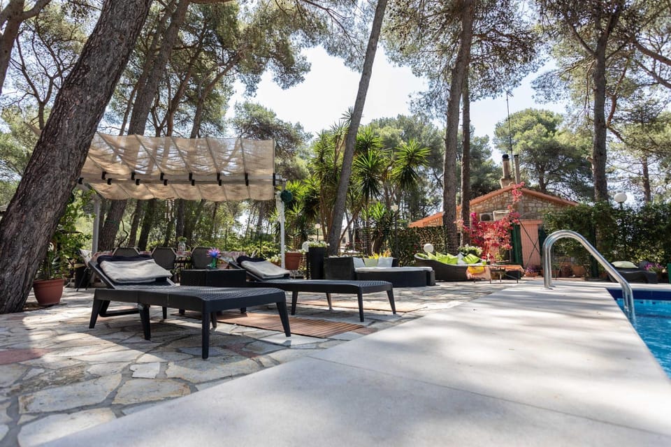 Property building, Living room, Swimming pool