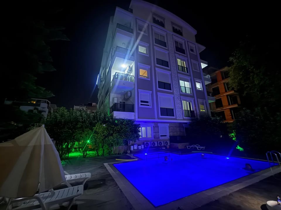 Property building, Night, Swimming pool