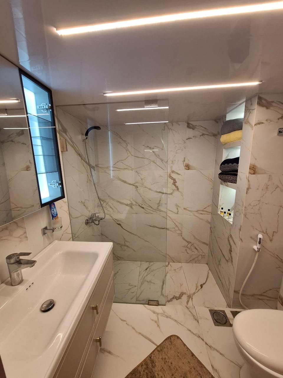 Shower, Toilet, Bathroom, Bath, hair dryier, towels