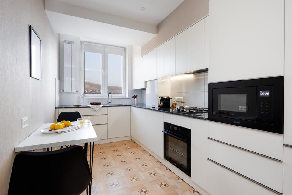 Kitchen or kitchenette, oven