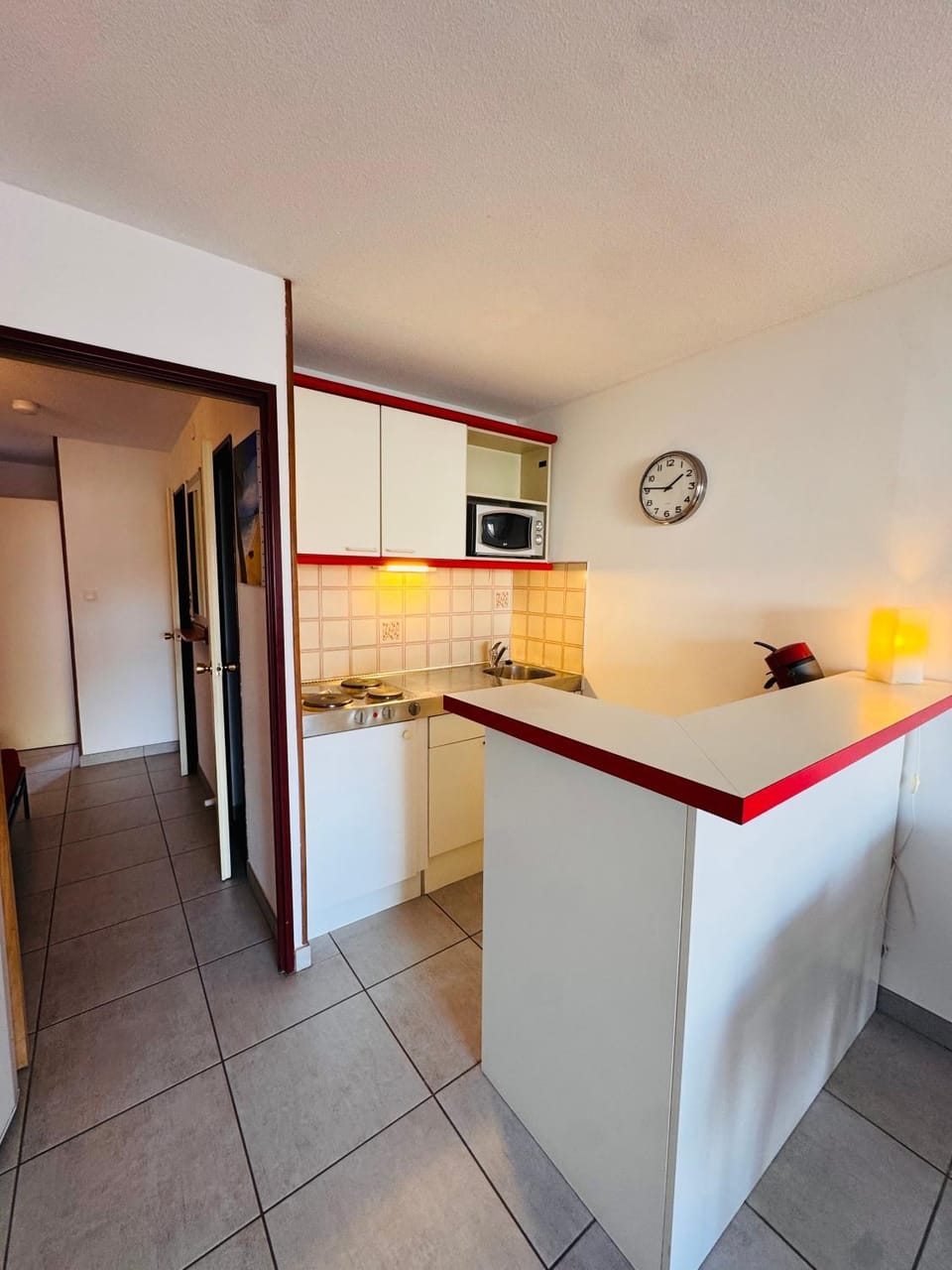 Kitchen or kitchenette, stove