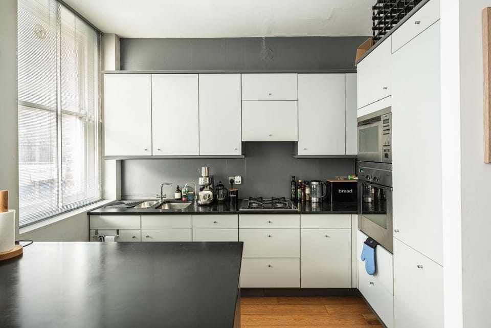 Kitchen or kitchenette, oven, stove, toaster