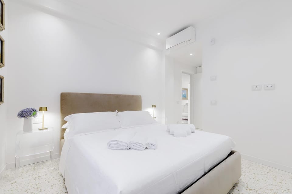 Bed, Photo of the whole room, Bedroom, towels, air conditioner