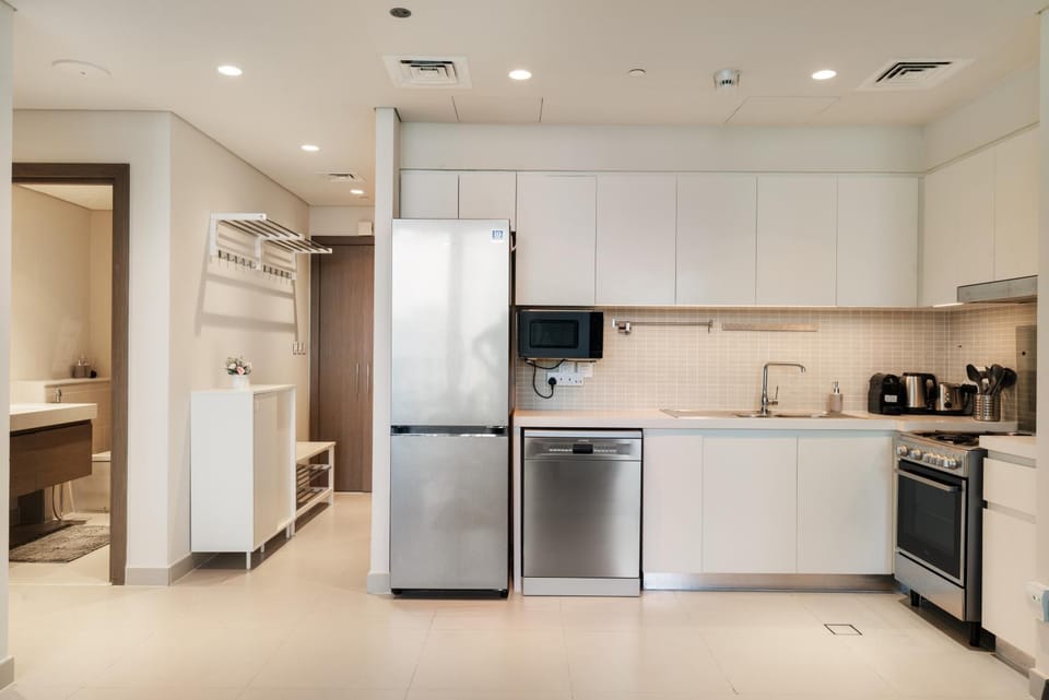 Kitchen or kitchenette, dishwasher, oven, stove, toaster