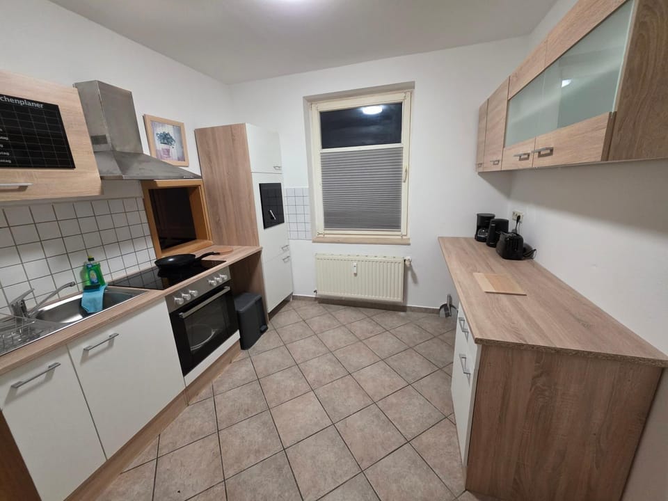 Kitchen or kitchenette, oven, stove