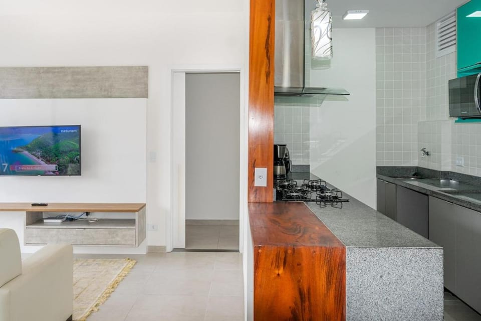 31 ITAJOBI - Sr Toninho · Apto central. Roupas de cama, Wi-Fi, A/C e piscina Apartment in Ubatuba