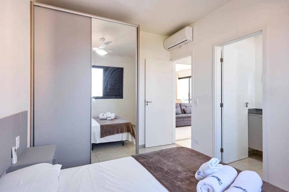 21 ITAJOBI - Filipe Toledo · Apto central. Roupas de cama, Wi-Fi, A/C e piscina Apartment in Ubatuba