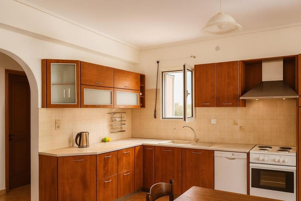 Kitchen or kitchenette, dishwasher, oven, stove, toaster