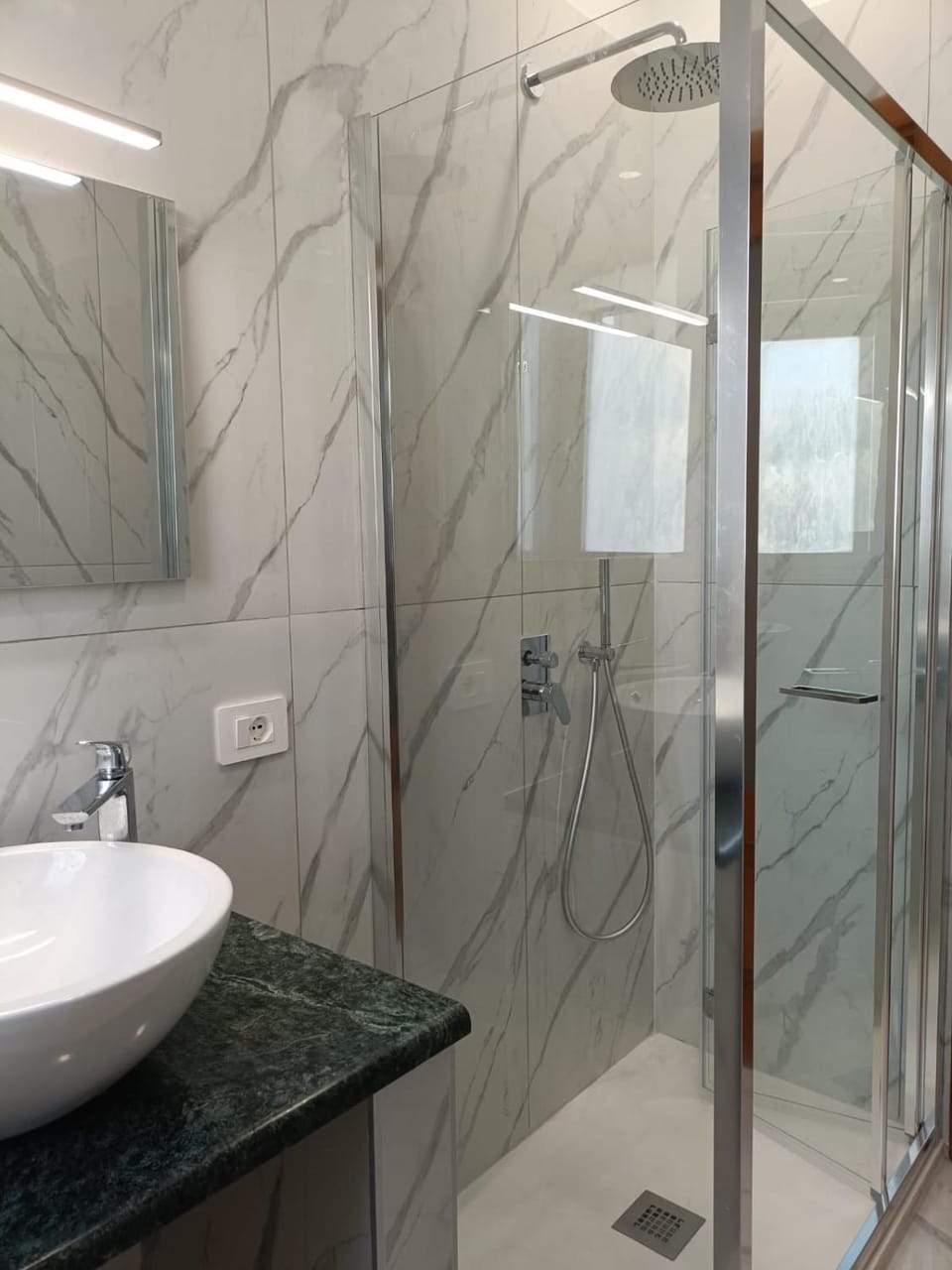 Shower, Bathroom, hair dryier, towels