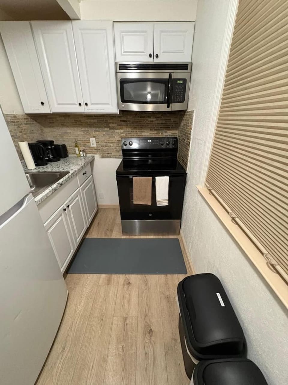 Kitchen or kitchenette, oven, stove, toaster