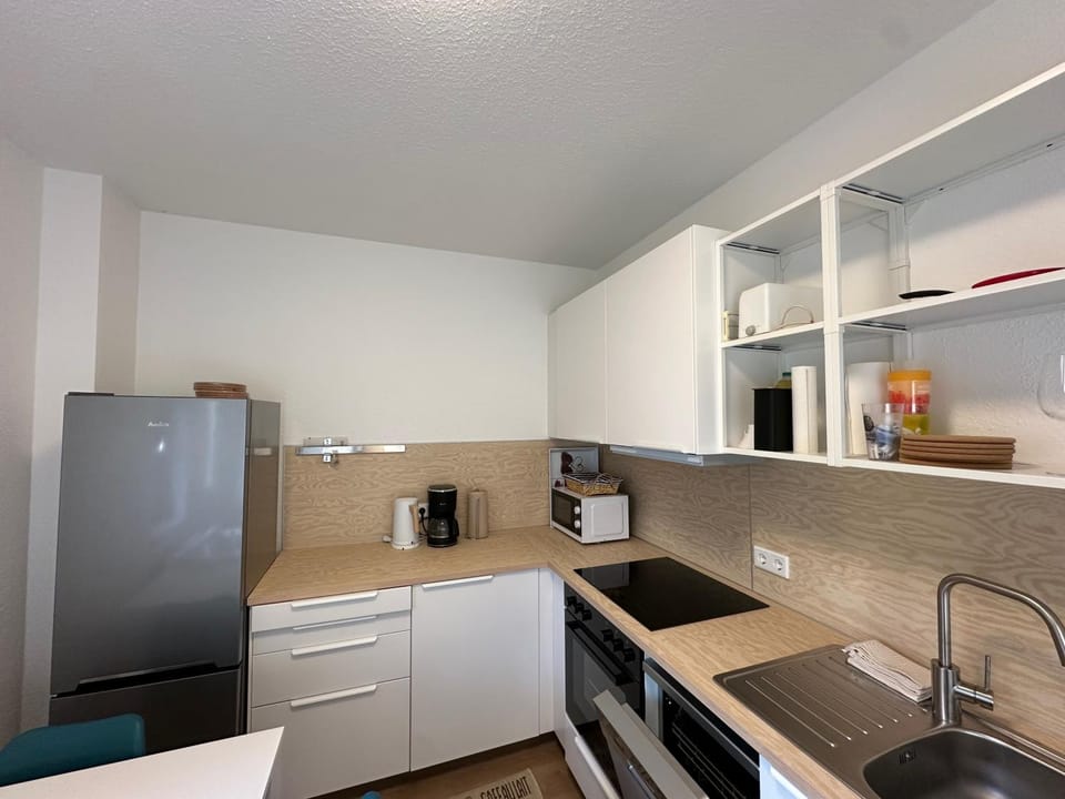 Kitchen or kitchenette, stove, kitchen