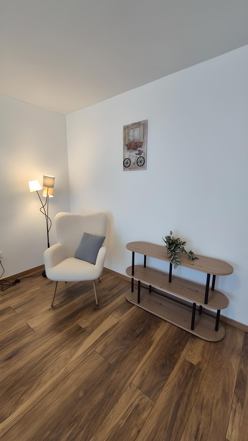 View (from property/room), Living room, Decorative detail, Decorative detail, Seating area, heating