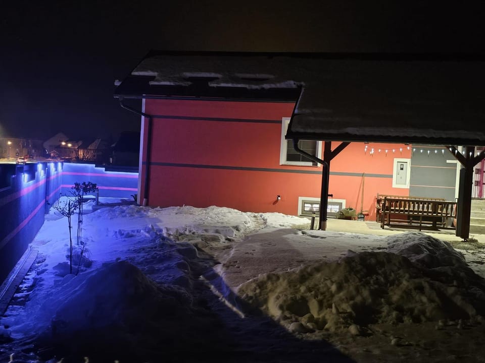 Property building, Patio, Night, Winter, Garden, Balcony/Terrace, Seating area, Parking